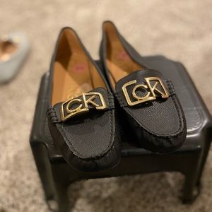 Black Calvin Klein penny loafers